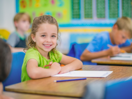 Teachers News Girl Writing (260 x 195 px)